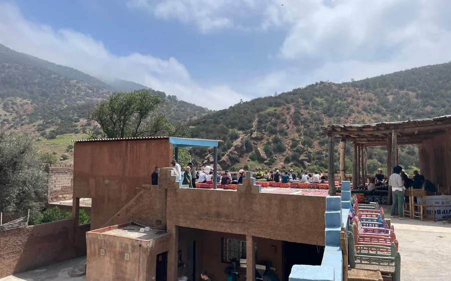A terrace restaurant in a green mountain valley